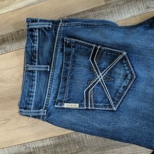 Cinch Men's Like New Grant Medium Wash Performance Relaxed Fit Boot Cut